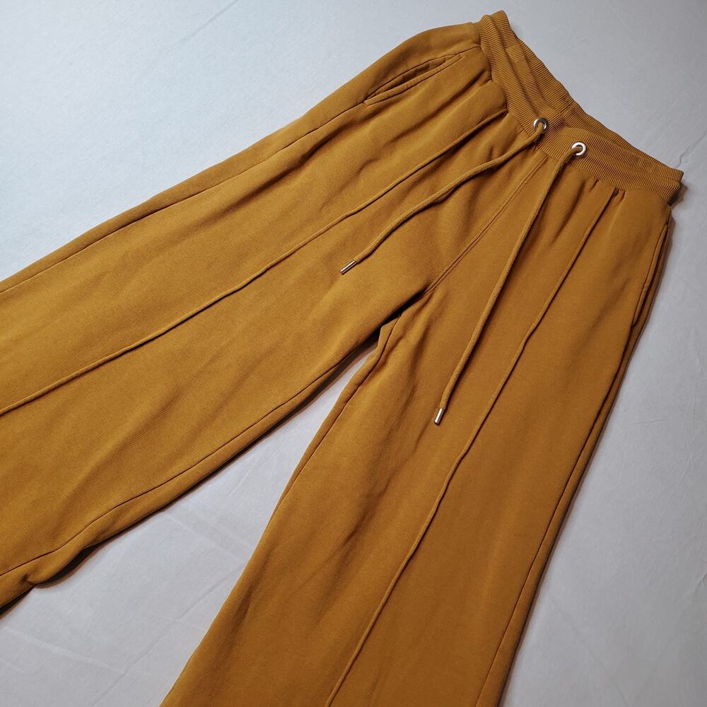 Free People Movement Women's Size XS Hot Shot Cotton French Terry Pants Gold